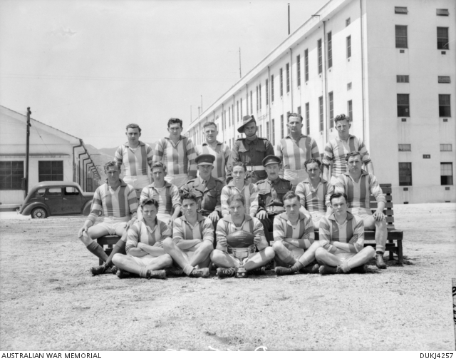 Team members, coaches and trainers of an unidentified rugby league team ...