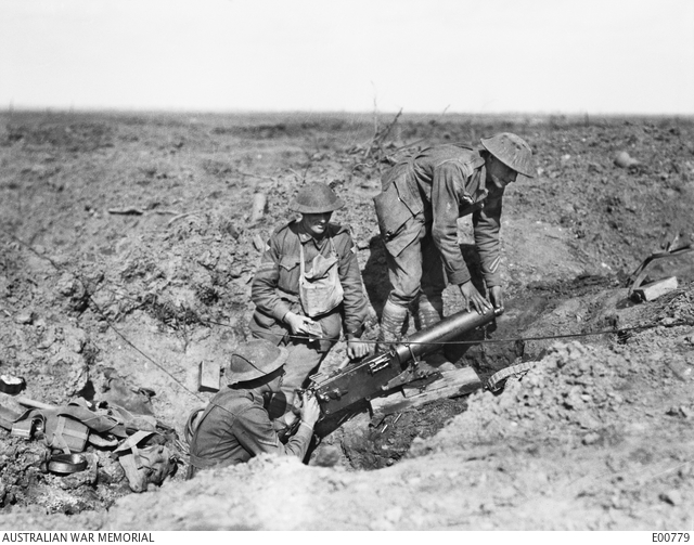 Three Australian machine gunners inspecting a German MG08 machine gun ...