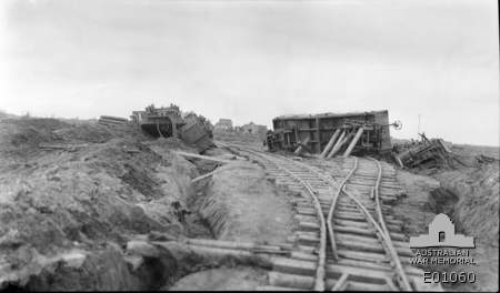 View of the overturned carriages which were the result of a heavy shell ...