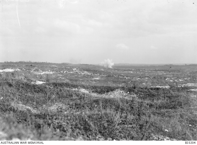 The bursting of an enemy shell on the Australian lines near Clery, just ...