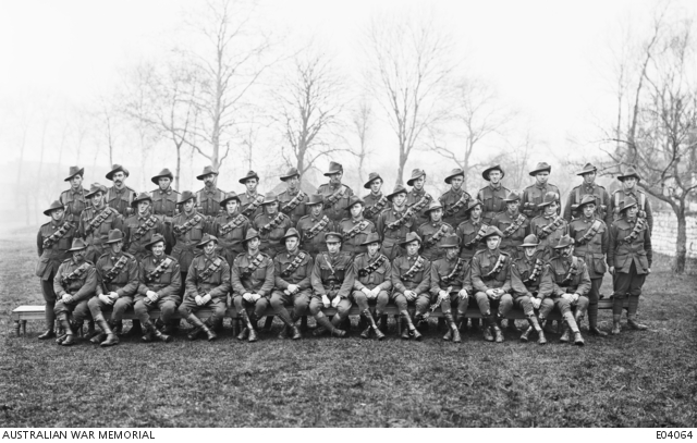 An outdoors group portrait of unidentified members of the Transport ...