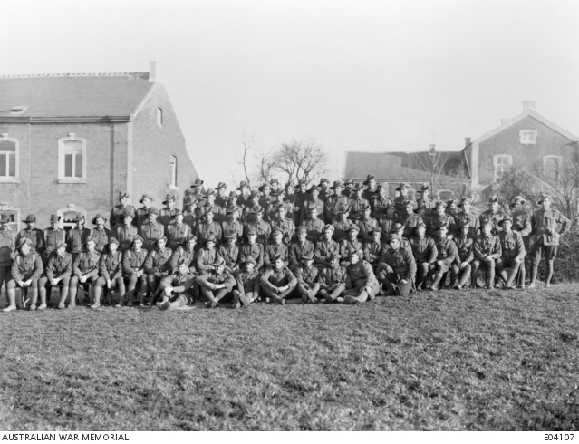 An outdoors group portrait of unidentified members of the 2nd Company ...