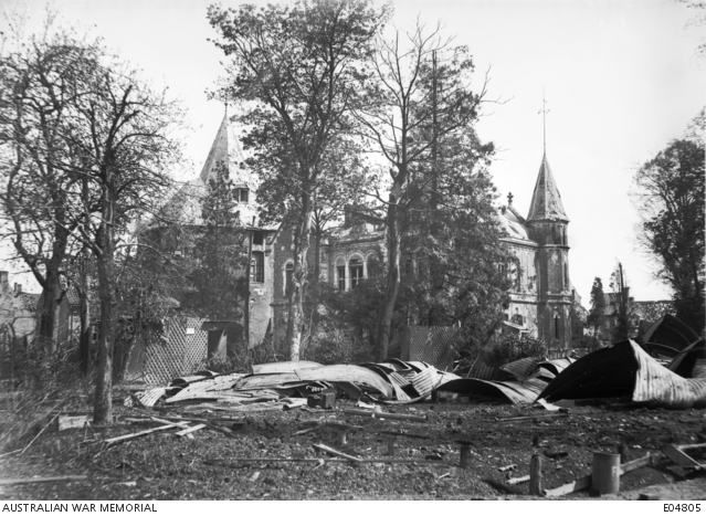 An exterior view of the shell damaged chateau that served as General ...