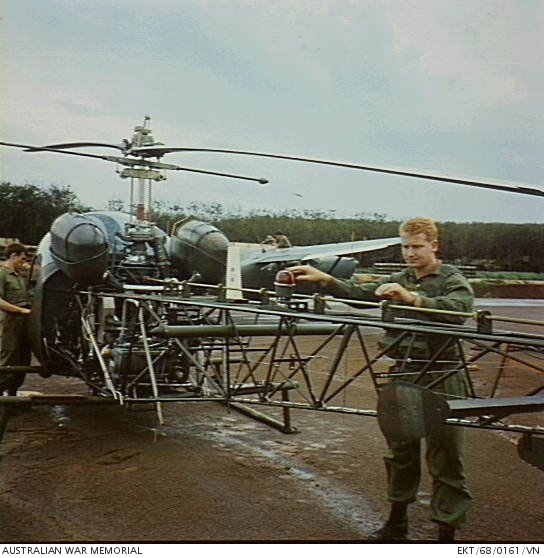 Nui Dat, South Vietnam. 1968. A pre flight check of Sioux helicopter by ...