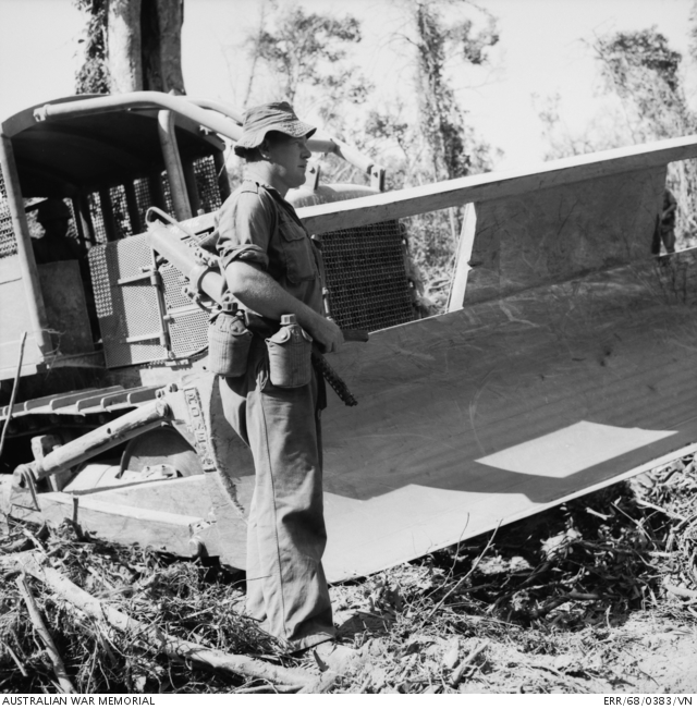 South Vietnam. 1968-04. Corporal Merv Wilson of Seymour, Vic, directing ...