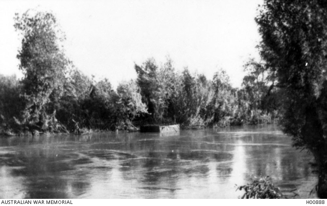 A raft shown in midstream while being used to cross the river ...