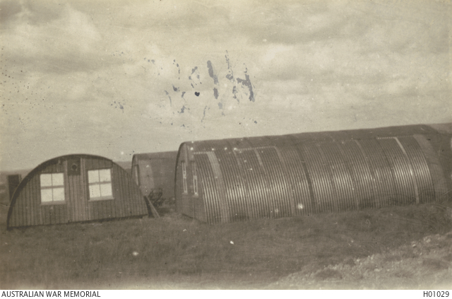 Three portable Nissen huts that were used as a Red Cross depot. During the  Flanders retreat of  | Australian War Memorial