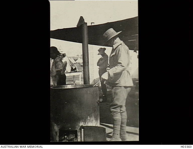 Liverpool, NSW. c. 1914. An Army cook supervising the preparation of a ...