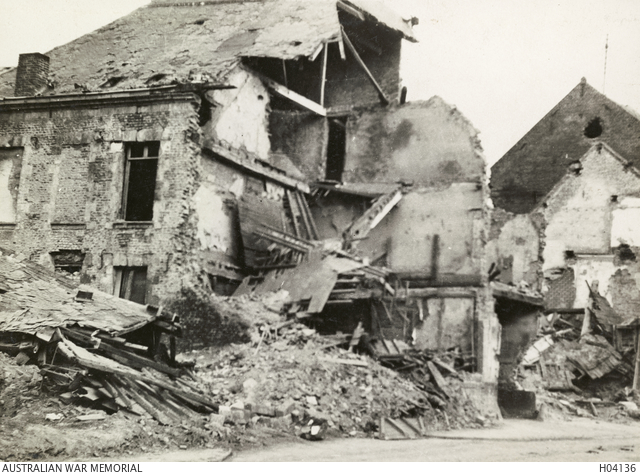 Shell ravaged houses. | Australian War Memorial