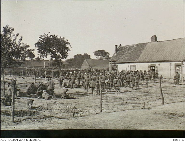 Western Front. c. 1916. German prisoners of war drawing their rations ...