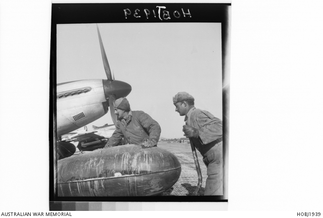 Maintenance men of 2 Squadron, South African Air Force (SAAF) wheel a ...