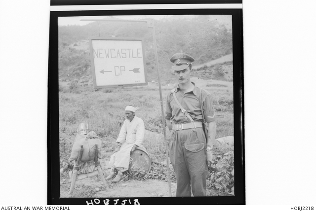 An unidentified British corporal from the Royal Military Police (RMP ...