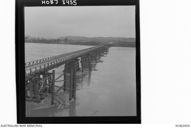 a-view-of-the-damaged-teal-bridge-over-the-flooded-imjin-river-note-a