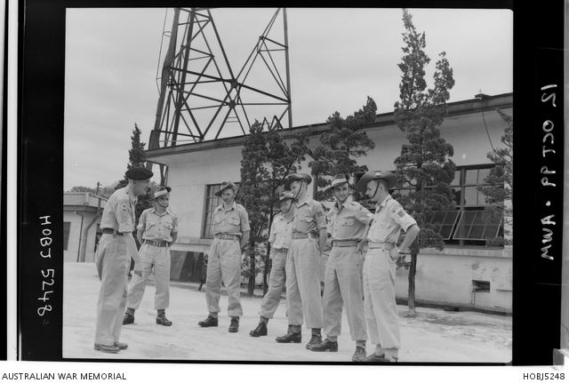 Kure, Japan. 5 August 1954. Some of the 30-odd members of the staff of ...