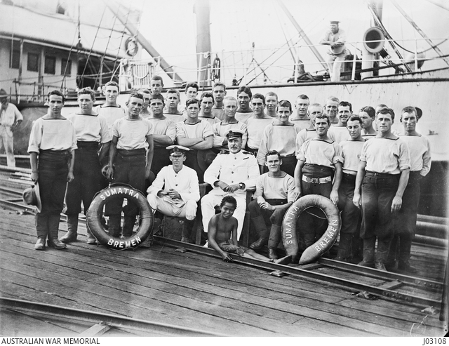 A group taken on the wharf at Rabaul, alongside the captured German ...