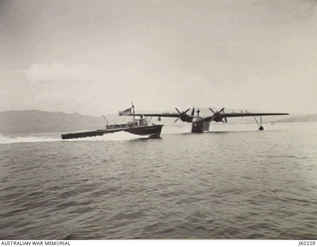 IWAKUNI, JAPAN. 1952. AN RAAF AIRSEA RESCUE TENDER PASSES A US NAVY ...