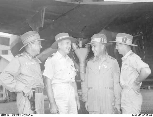 Senior RAAF officers at Vung Tau, South Vietnam discuss some of the ...