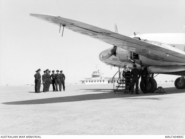 Members of 78 Fighter Wing RAAF waiting on the tarmac before boarding ...