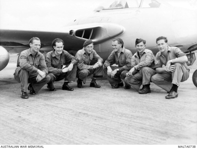 Group portrait of ground staff members from 78 Fighter Wing RAAF in ...