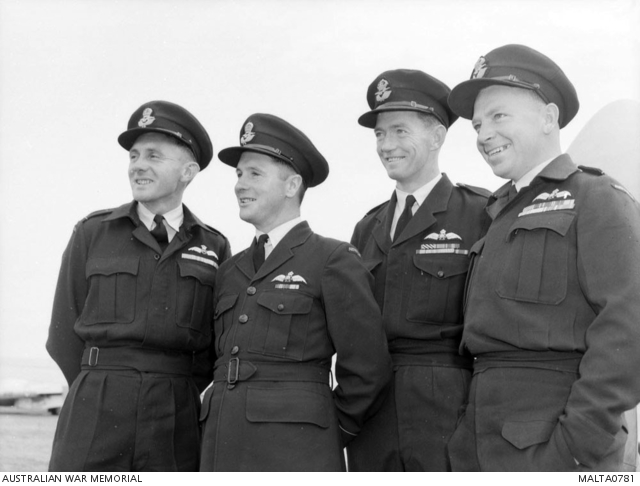 Group portrait of four pilots of 78 Fighter Wing RAAF who flew in the ...