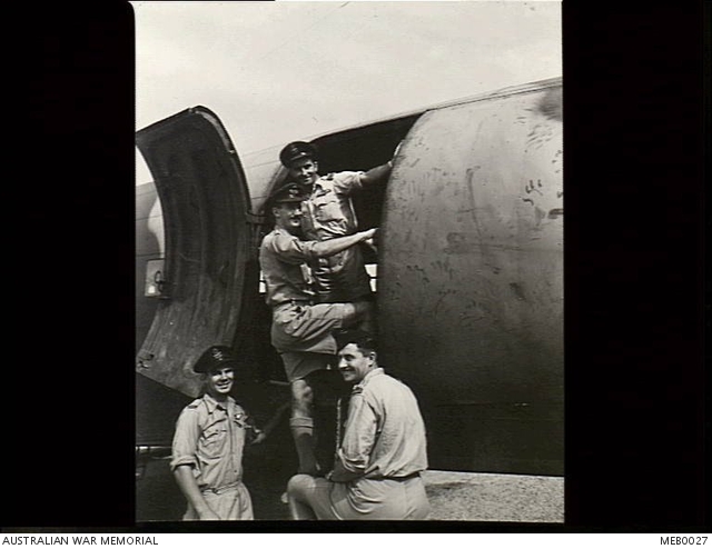 Western Desert. c. August 1943. Three RAAF and one RNZAF members of an ...