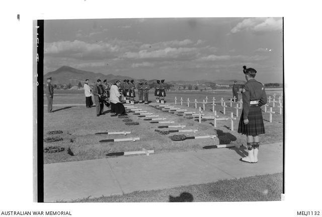 A burial party from the 1st Battalion, The Royal Australian Regiment ...