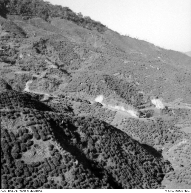 the-rugged-terrain-is-apparent-here-as-a-mixed-convoy-of-gmc-cckw-353