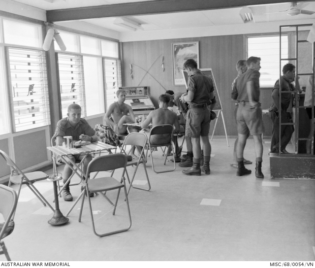 Vung Tau, South Vietnam. 1968. Soldiers relaxing over a meal and drinks