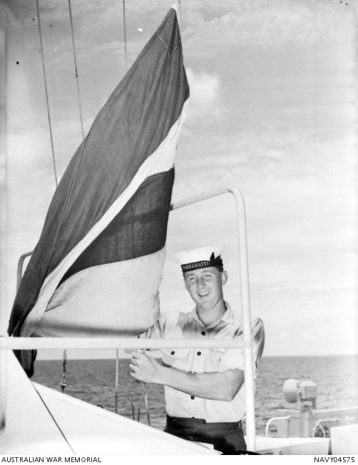 Tactical Operator Graham Calvert of Wynnum, Qld at the flag hoist