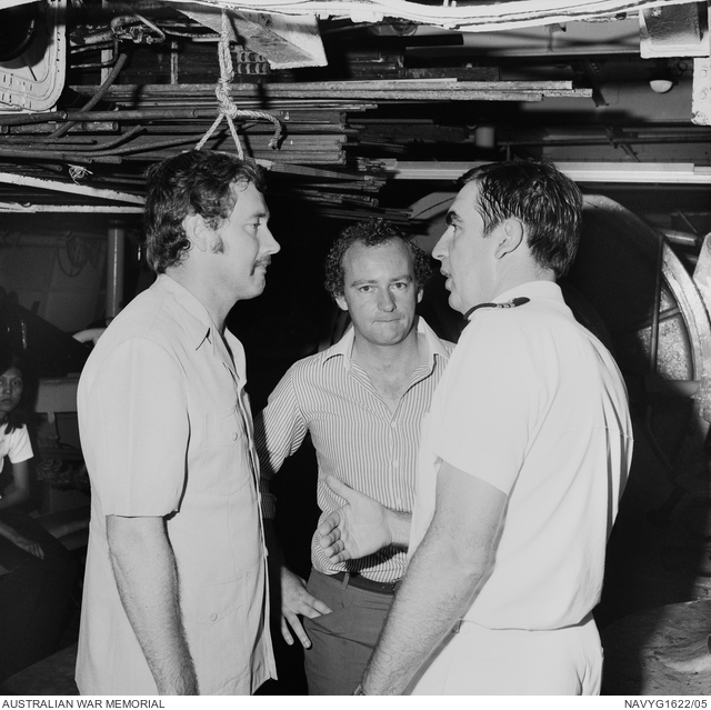 Vietnamese refugees leaving HMAS Melbourne. On the night of 21 June ...