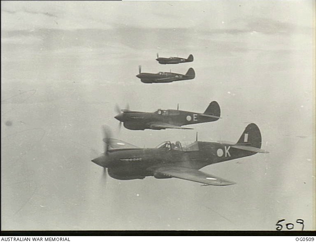 NEAR HORN ISLAND, QLD. 1943-12-23. FOUR P40 KITTYHAWK FIGHTER AIRCRAFT ...