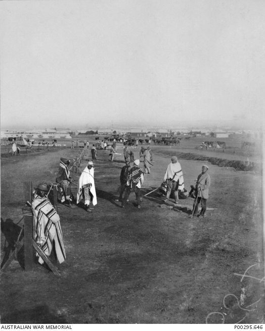 BLOEMFONTEIN REMOUNT CAMP, SOUTH AFRICA, C 1901. NATIVE WORKERS AT PICKET LINES. HORSES HAVE ALL