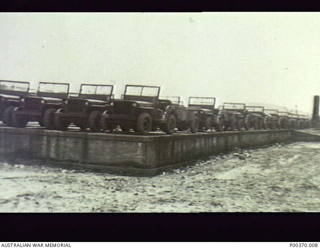 VEHICLES WAITING FOR 1ST BATTALION THE ROYAL AUSTRALIAN REGIMENT (1RAR ...