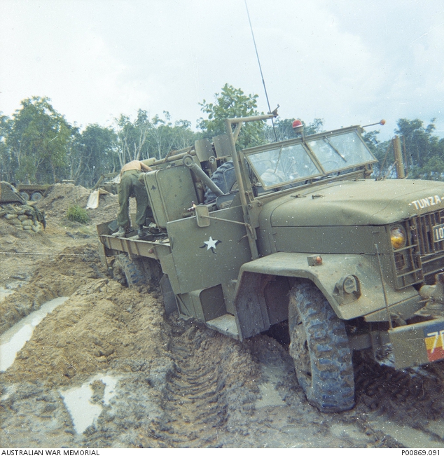 A DAMAGED AUSTRALIAN M543 5 TON WRECKER, NAMED 'TUNZA GUTS' BOGGED