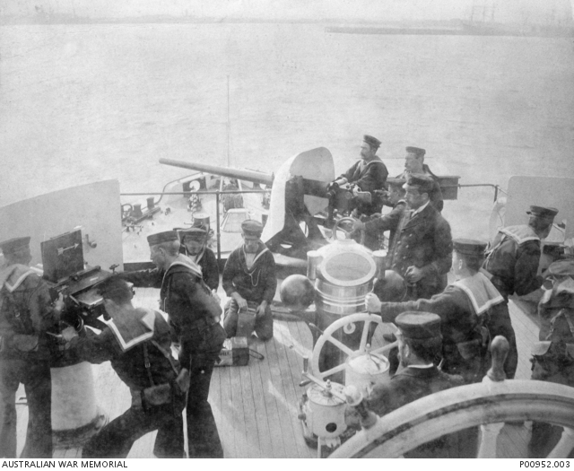 AUSTRALIA, C 1895. MACHINE GUN BATTERY IN ACTION IN THE FLYING DECK OF