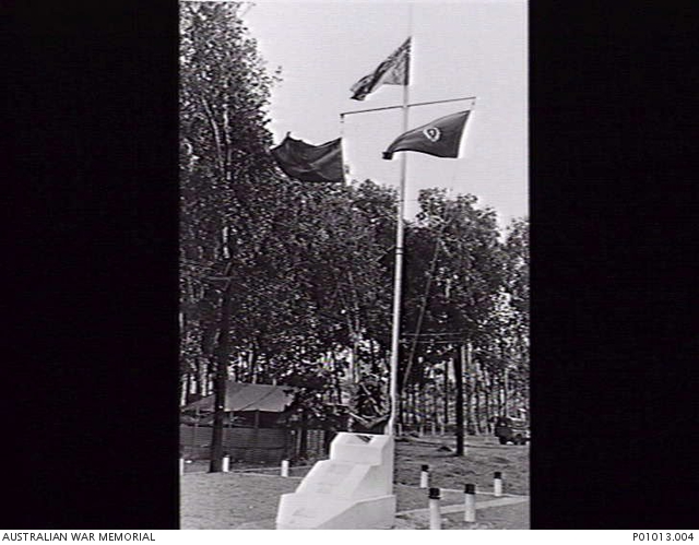 VIETNAM. THE FLAGPOLE AND THE ROYAL AUSTRALIAN REGIMENT MEMORIAL AT NUI ...