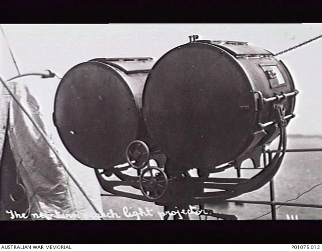 1910. A TWIN SEARCH LIGHT PROJECTOR, POSSIBLY ON THE THIRD CLASS ...