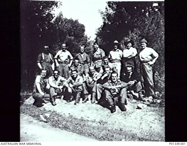 MEMBERS OF 2/3RD BATTALION, CARRIER PLATOON, AT THE STAGING CAMP AT ...