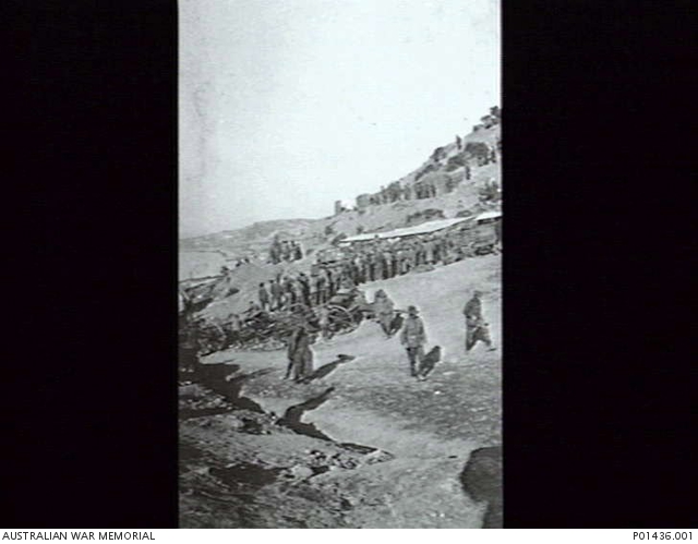 GALLIPOLI. 1915. SOLDIERS QUEUE TO RECEIVE RATIONS FROM A CANTEEN AT ...