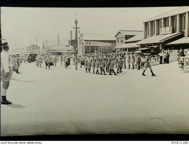 Kure, Japan, 1950-07-21. Slow marching with their rifles reversed ...