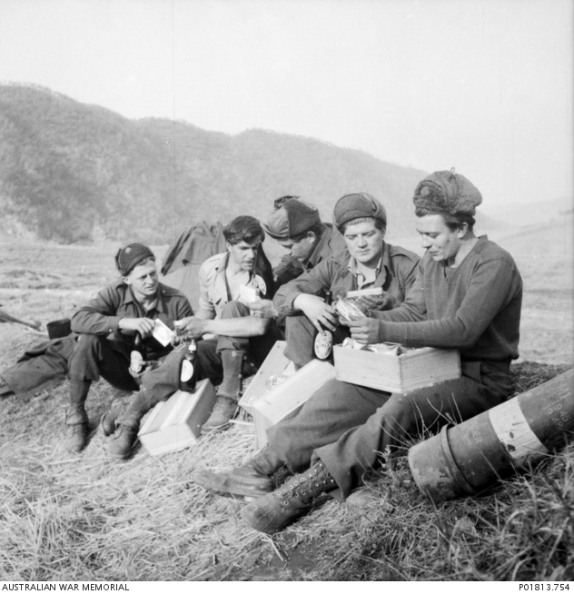 chipyong-ni-area-korea-1951-03-sitting-on-a-grassy-embankment