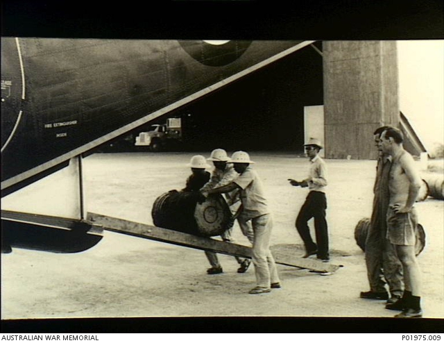 Da Nang, Vietnam. 1965. Charlie Downes, fitter, (far right) of RAAF