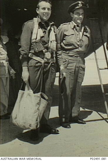 Karachi, India. c. 1945. Warrant Officer R. E. Smith DFM, navigator of ...