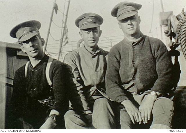 An informal group of three Australian soldiers on board SS Suevic which ...