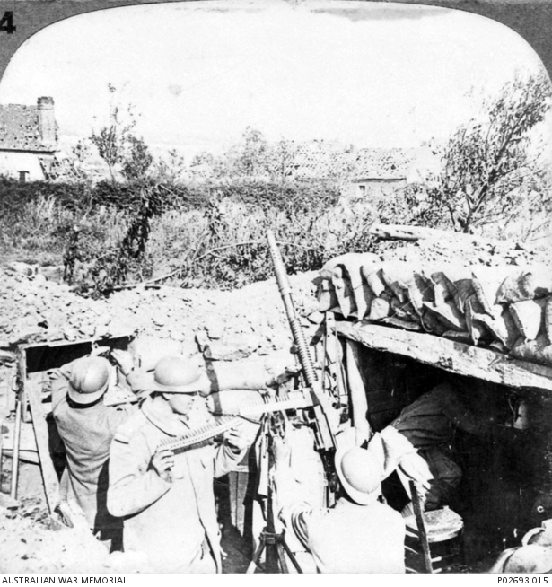 France. Two French soldiers using a machine gun mounted on a special ...
