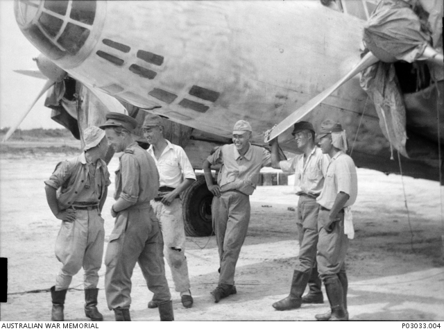 The Japanese crew and an Australian war correspondant(?) share a ...