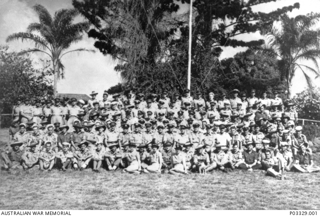 Group portrait of field, support and coastwatcher members of 'M ...