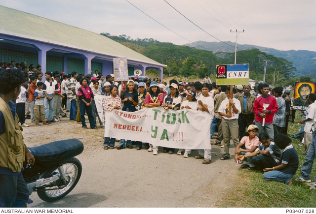 East Timorese locals gathered at a National Council of Timorese ...