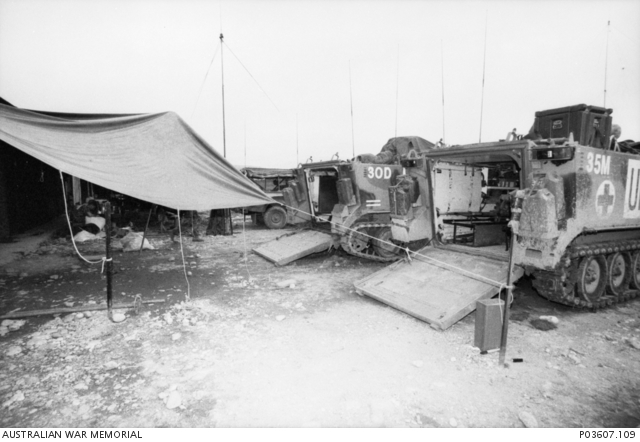 Two armoured personnel carriers (APCs) (numbers 30D and 35M) parked at ...