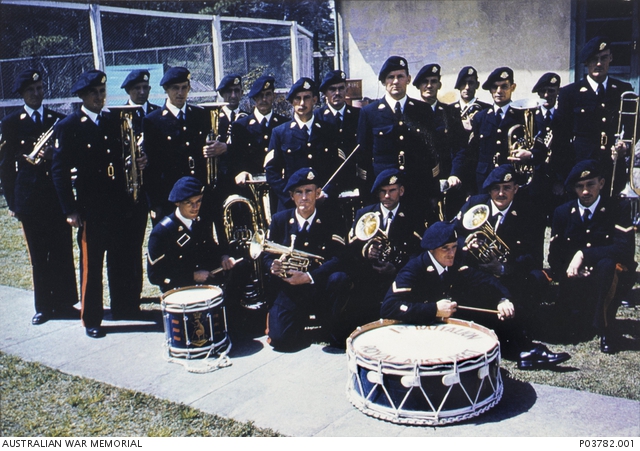 An outdoors group portrait of the band of the 1st Battalion, The Royal ...